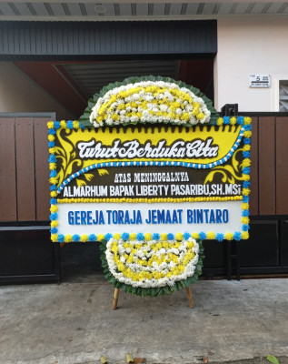 Papan Bunga Duka di Ario Kemuning